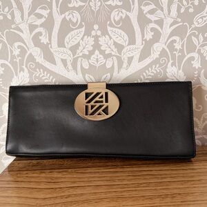 Anne Klein Vintage Black Smooth Leather Medallion Framed Clutch Gold Hardware